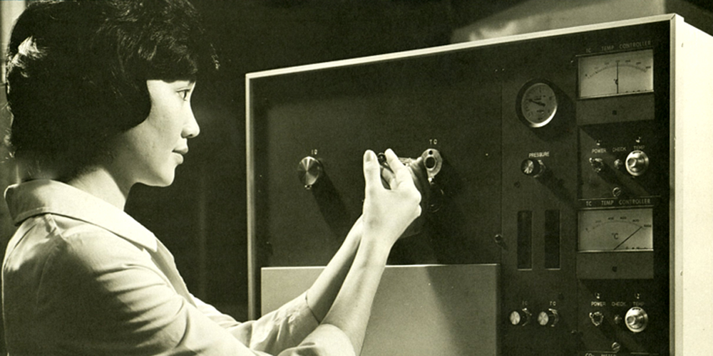 Woman working with old Shimadzu TOC